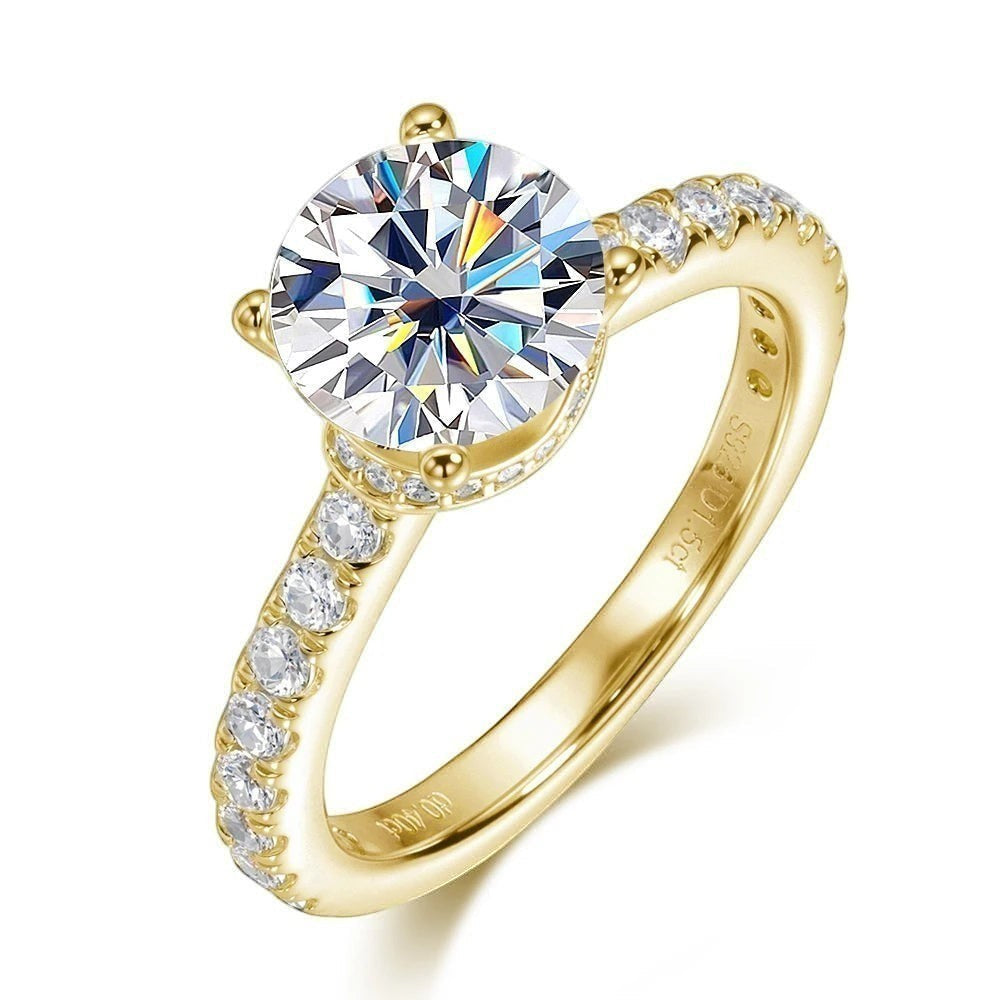Bee-Bees 1.5ct round brilliant moissanite engagement ring in 18k gold-plated sterling silver with pavé band.
