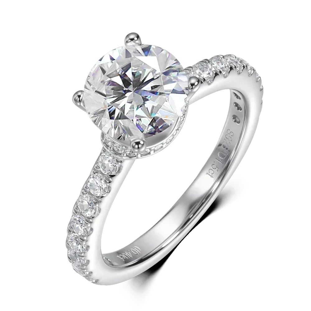 Bee-Bees 1.5ct round brilliant Moissanite engagement ring in sterling silver with 18k gold plating and pav
uevo band.