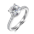 Bee-Bees 1.5ct round brilliant Moissanite engagement ring in sterling silver with 18k gold plating and pav
uevo band.