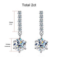 Bee-Bees 18k white gold plated sterling silver drop earrings with 1ct D color VVS1 moissanite and zircon accents.