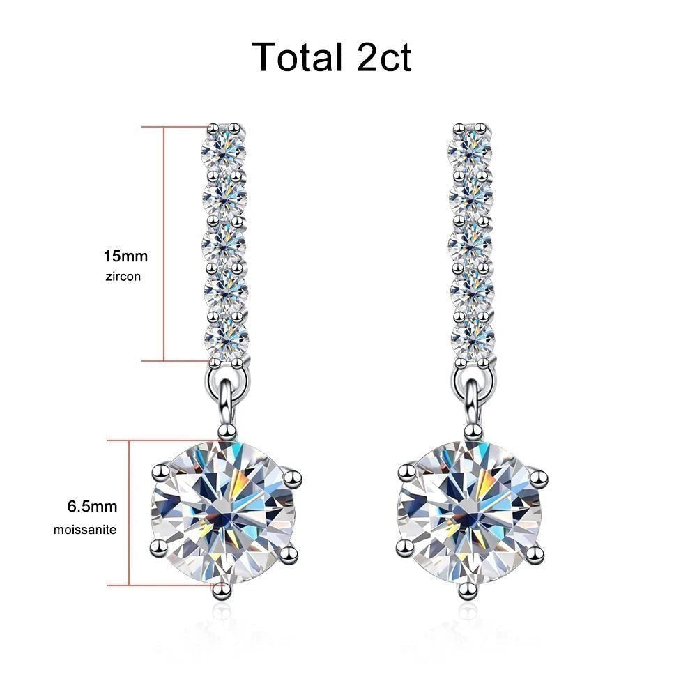 Bee-Bees 18k white gold plated sterling silver drop earrings with 1ct D color VVS1 moissanite and zircon accents.