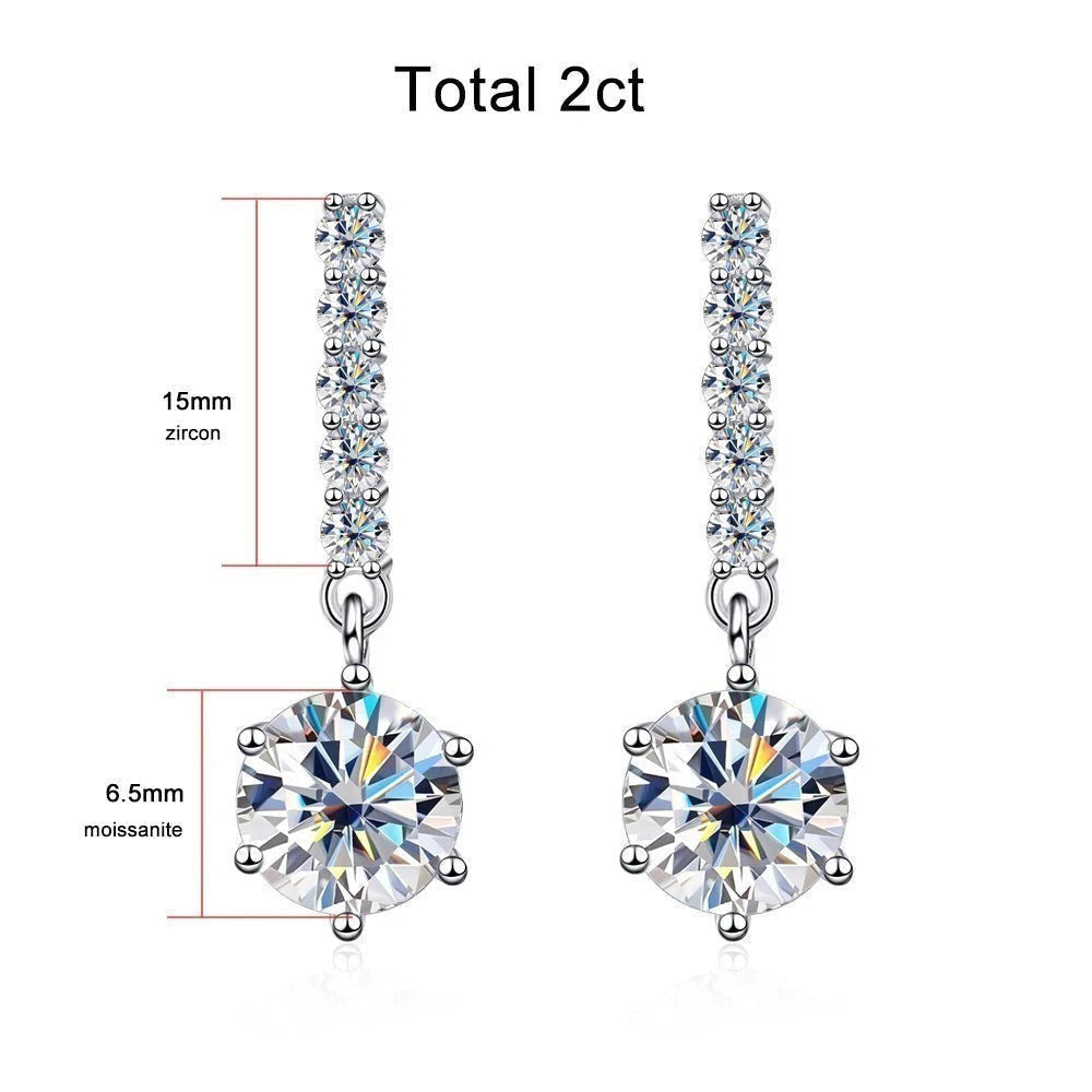 Bee-Bees 18k white gold plated sterling silver drop earrings with 1ct D color VVS1 moissanite and zircon accents.