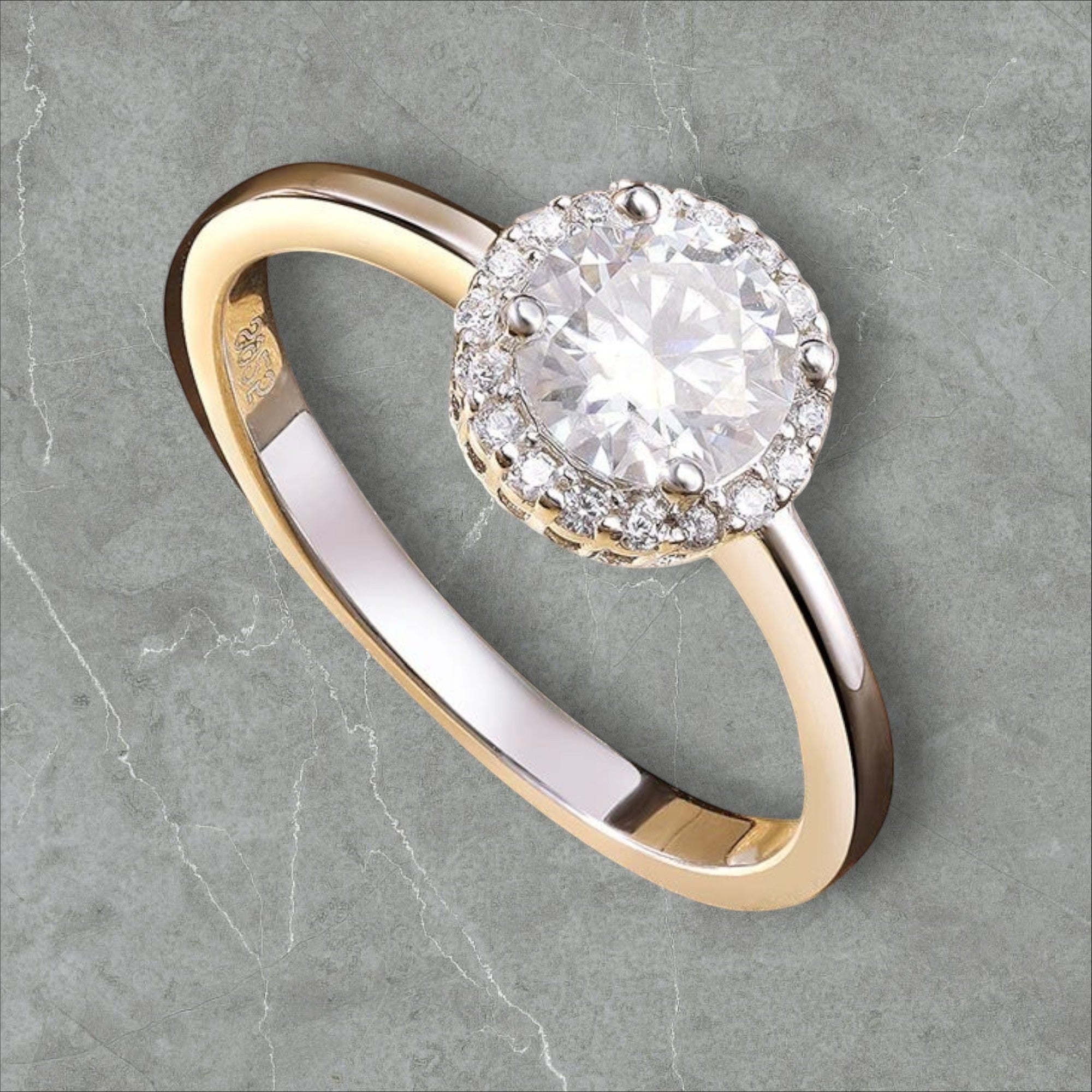 Bee-Bees 1ct round brilliant cut moissanite engagement ring in 925 sterling silver with 18k white gold plating.