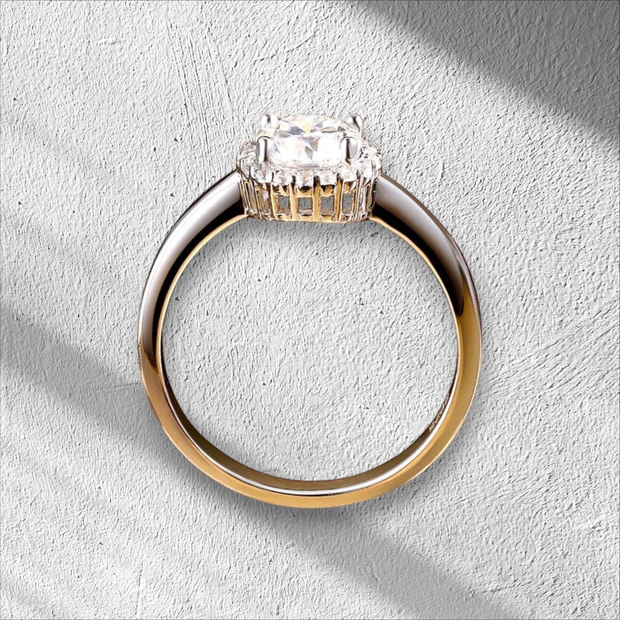 Bee-Bees 1ct round brilliant cut moissanite solitaire engagement ring in 925 sterling silver with 18k white gold plating.