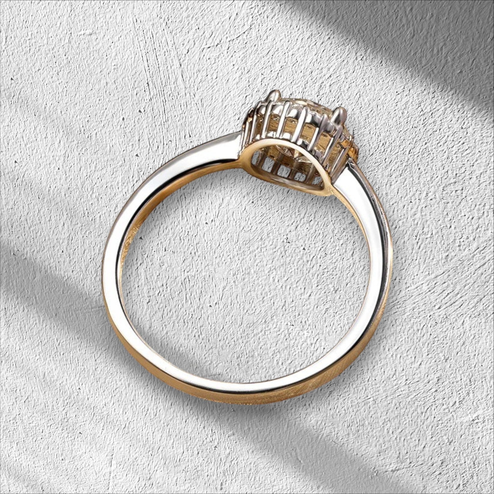 Bee-Bees 1ct round brilliant cut moissanite solitaire engagement ring in 925 sterling silver with 18k white gold plating.