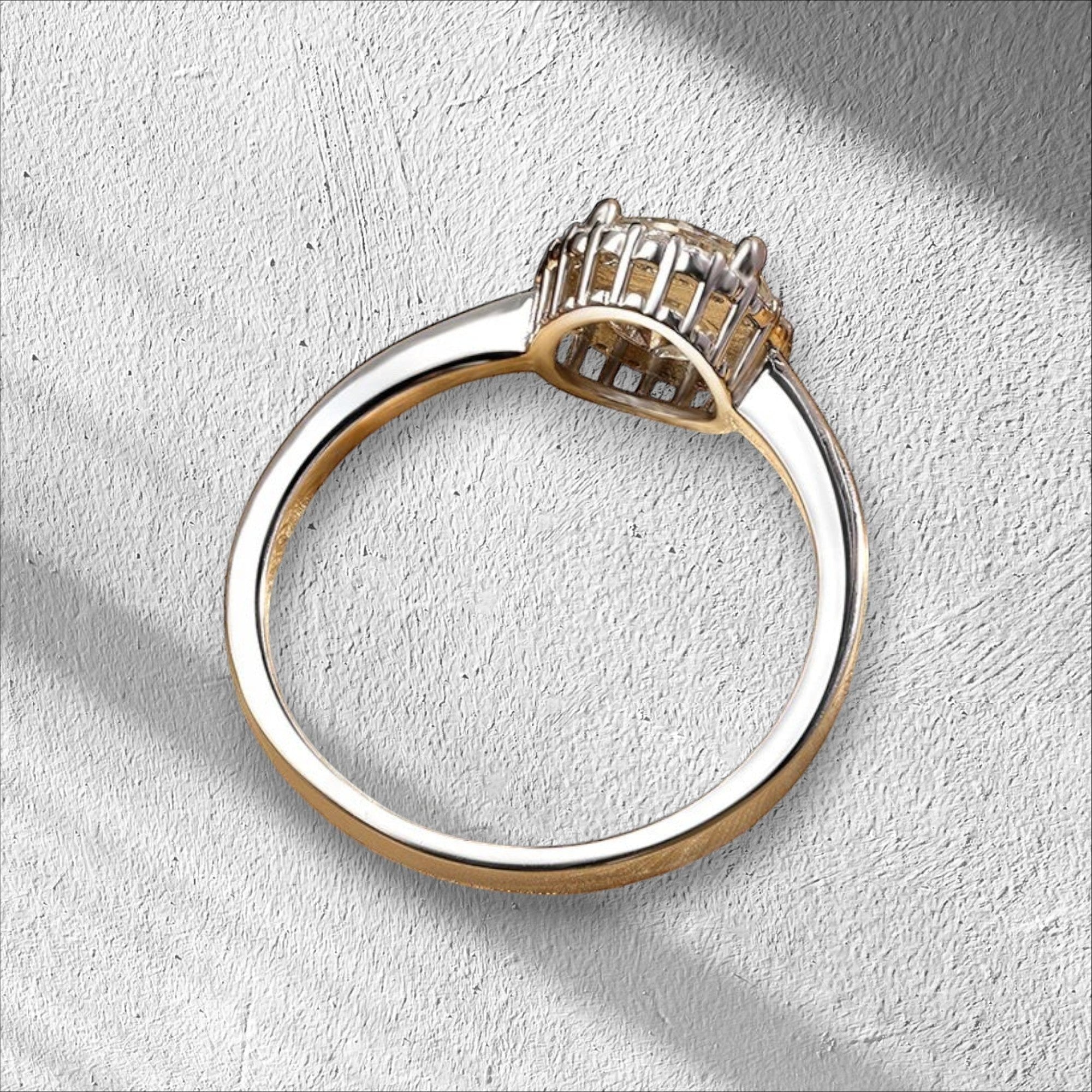 Bee-Bees 1ct round brilliant cut moissanite solitaire engagement ring in 925 sterling silver with 18k white gold plating.