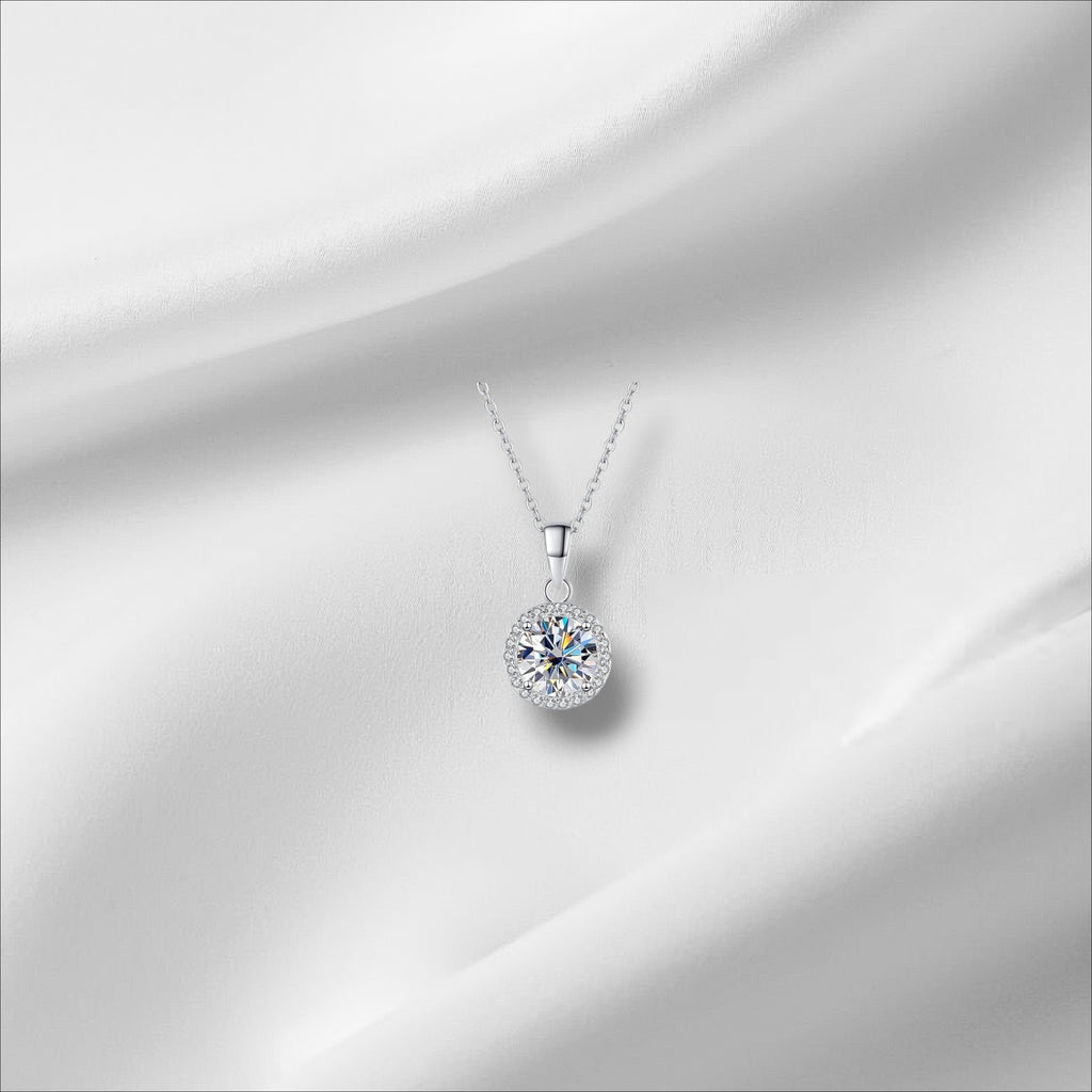 Bee-Bees 1ct round D color VVS1 moissanite solitaire necklace in 925 sterling silver with 18k white gold plating.