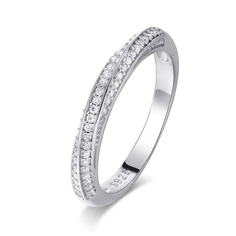 Bee-Bees 1mm sterling silver eternity band with pave-set moissanite stones and 18K white gold plating.