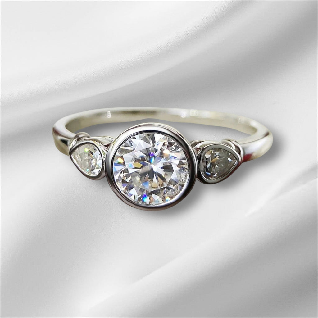 Bee-Bees 1.6ct 3-stone moissanite engagement ring in 925 sterling silver with 18k white gold plating. GRA certified.