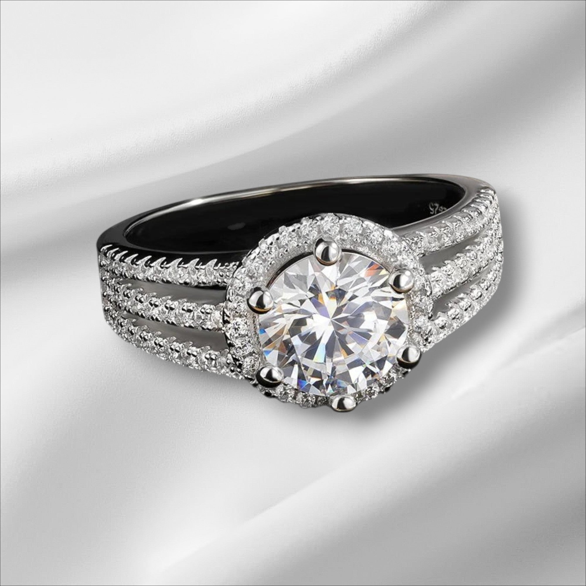 Bee-Bee's 3ct round brilliant cut moissanite engagement ring in sterling silver with 18k white gold plating and halo setting.