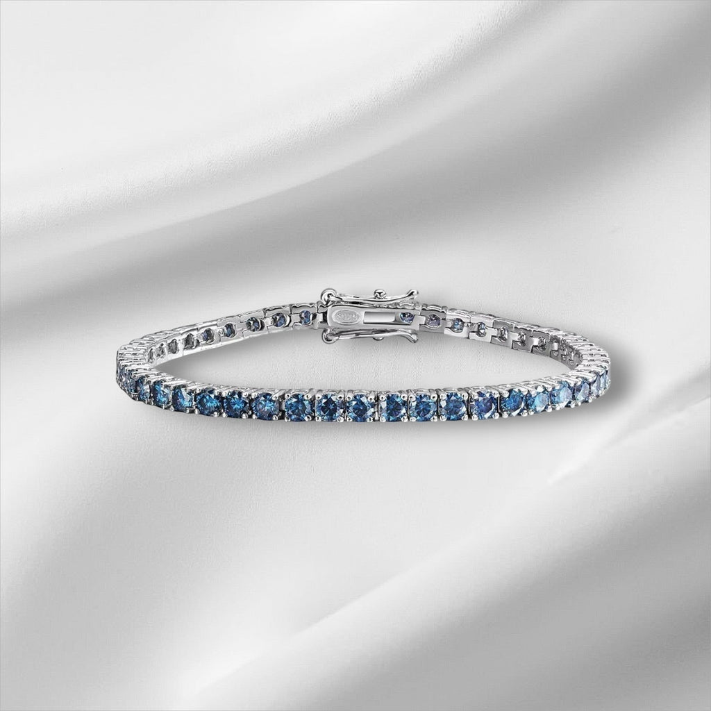 Bee-Bees blue moissanite tennis bracelet crafted from S925 sterling silver with 18k white gold plating.