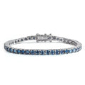 Bee-Bees blue moissanite tennis bracelet crafted from S925 sterling silver with 18k white gold plating. Features round-cut blue stones.