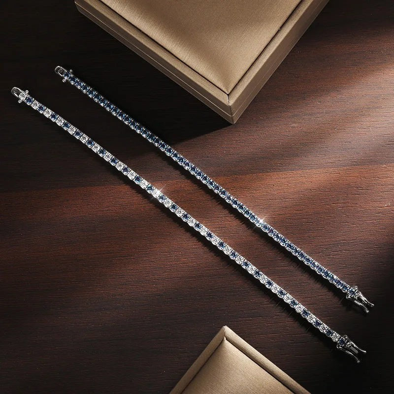 Bee-Bees blue moissanite and white diamond tennis bracelet in sterling silver with white gold plating.