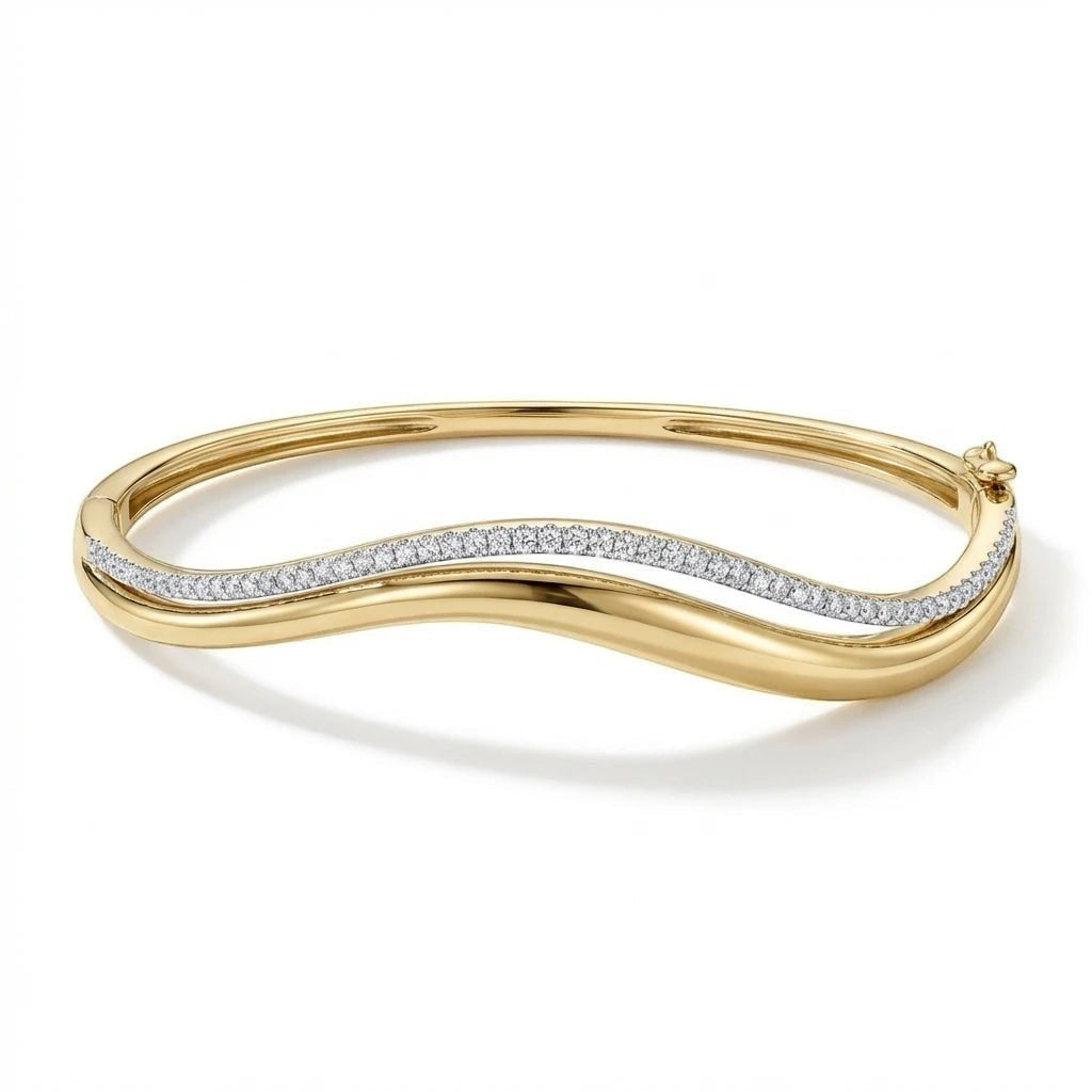 Bee-Bee's double wavy bangle in 18K gold plated sterling silver with 1.5mm D Color Moissanite stones.