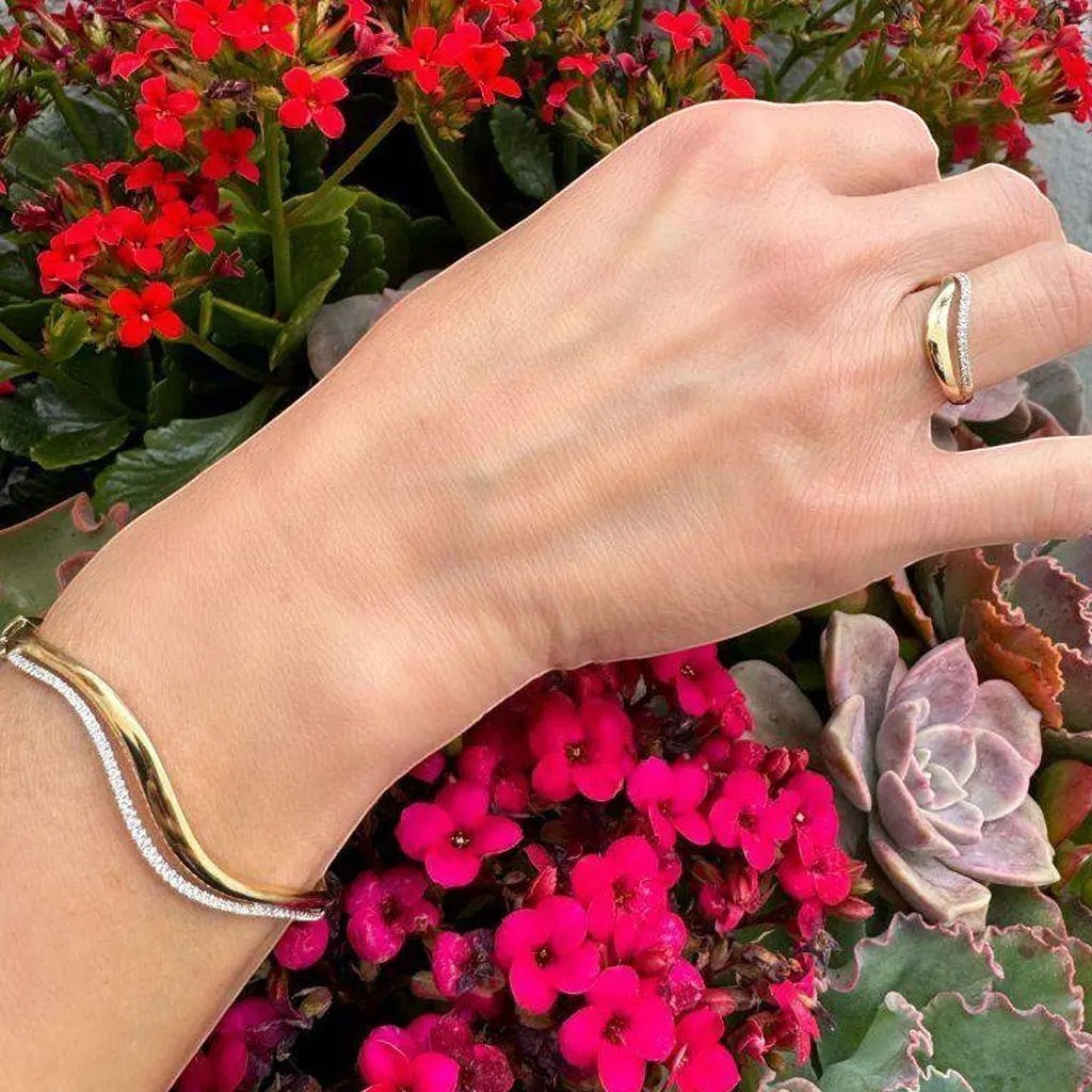 Bee-Bee's double wavy bangle with 1.5mm D Color Moissanite stones in 18K gold plated s925 sterling silver.