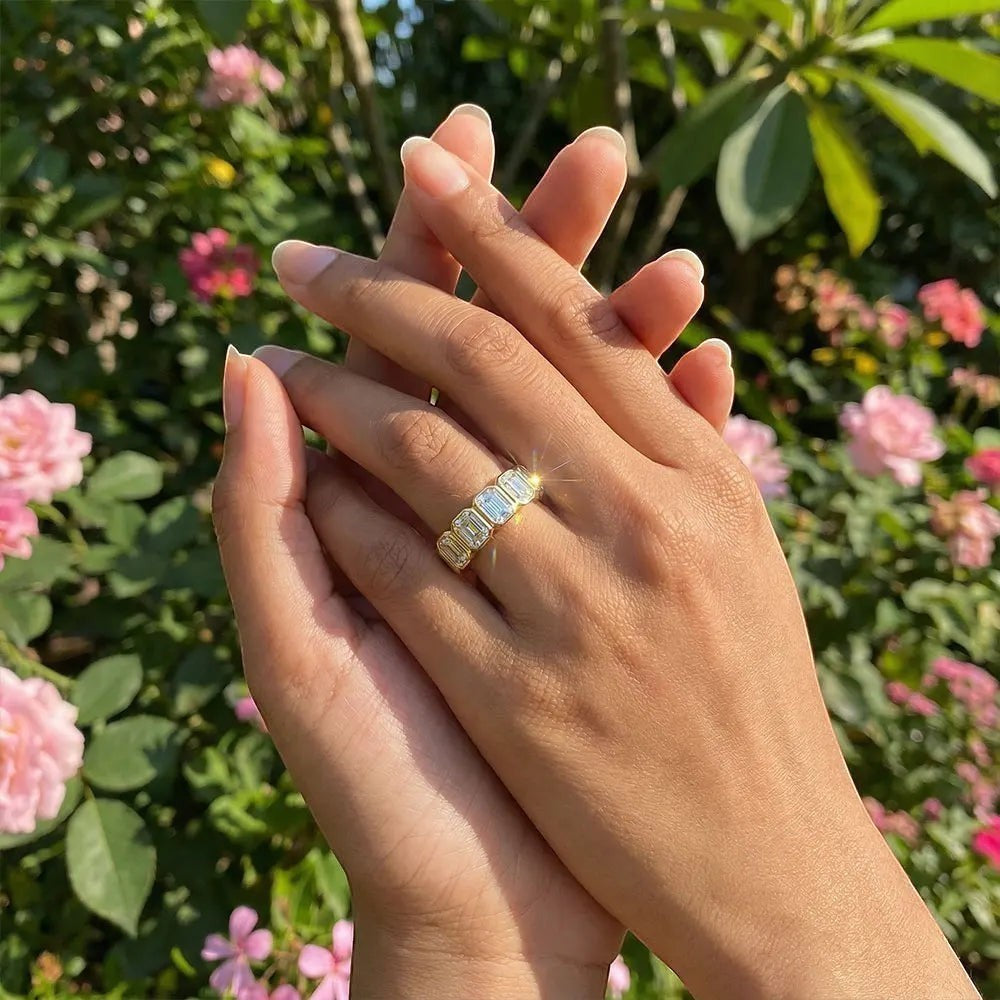 Bee-Bees 2.5ctw emerald cut moissanite 5-stone anniversary band in 18k gold plated sterling silver.