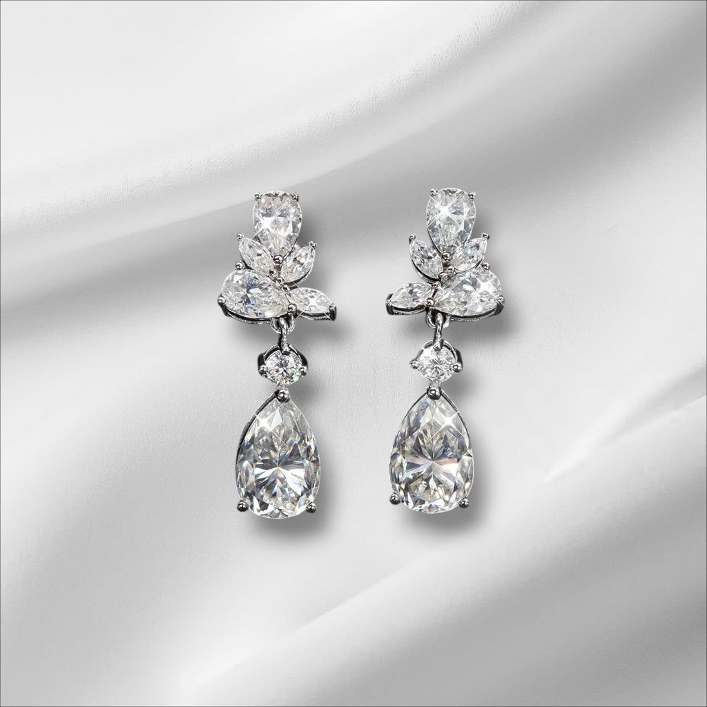 Bee-Bees Emerald Cut Moissanite Drop Earrings with 8.8ct D Color stones and 18k gold plating.