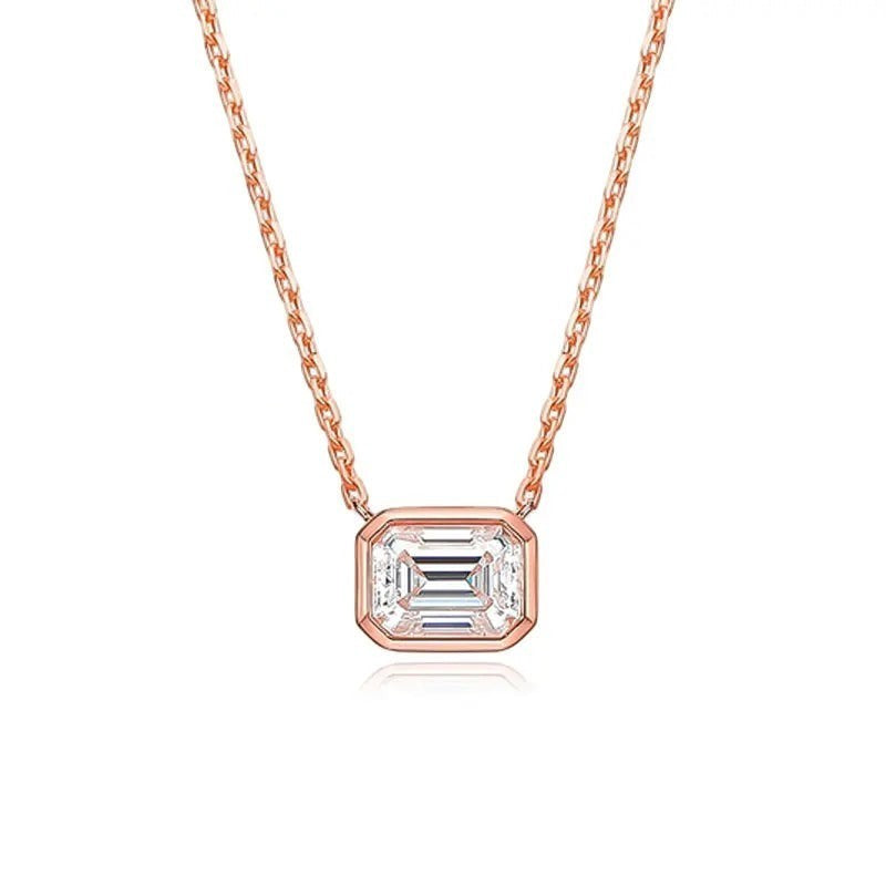 Bee-Bee's 2ct emerald cut moissanite necklace in rose gold plated sterling silver with D color and VVS1 clarity.