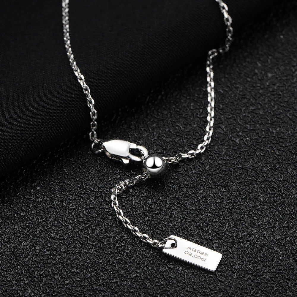 Bee-Bees 2ct emerald cut moissanite necklace with adjustable sterling silver chain and lobster clasp.