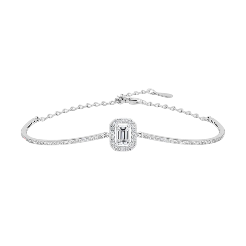 Bee-Bees emerald cut moissanite tennis bracelet in 925 sterling silver with a delicate chain and halo setting.
