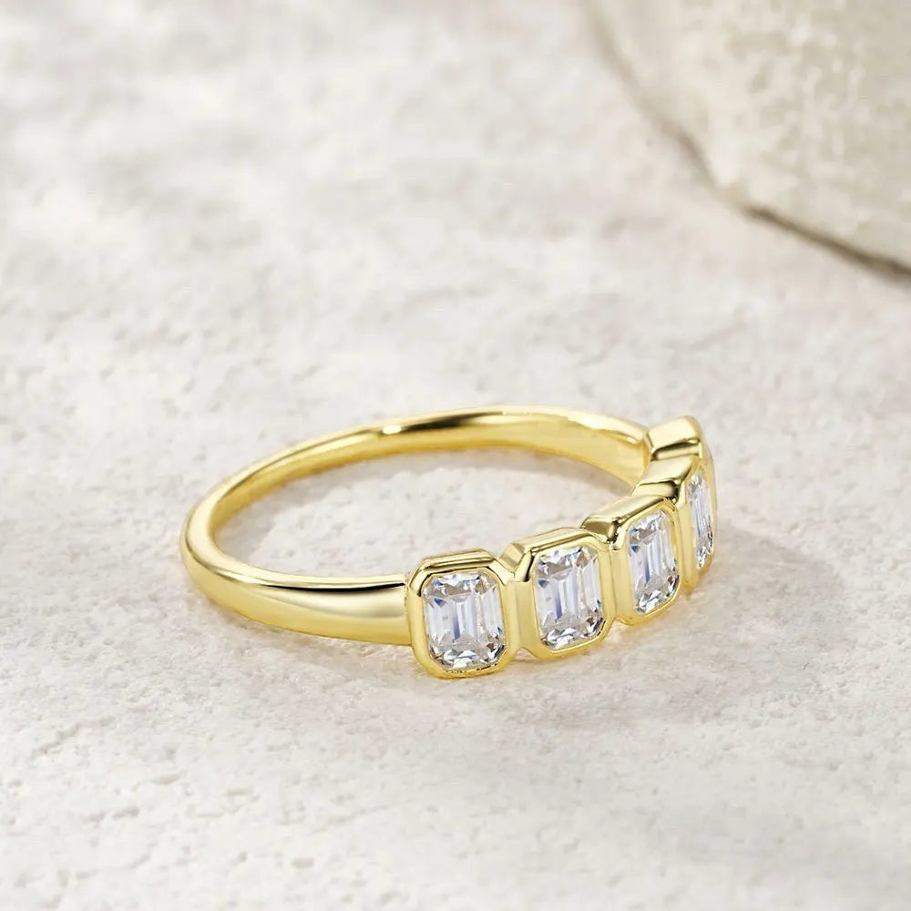 Bee-Bees 2.5ctw emerald cut moissanite 5-stone band in 18k gold plated sterling silver.
