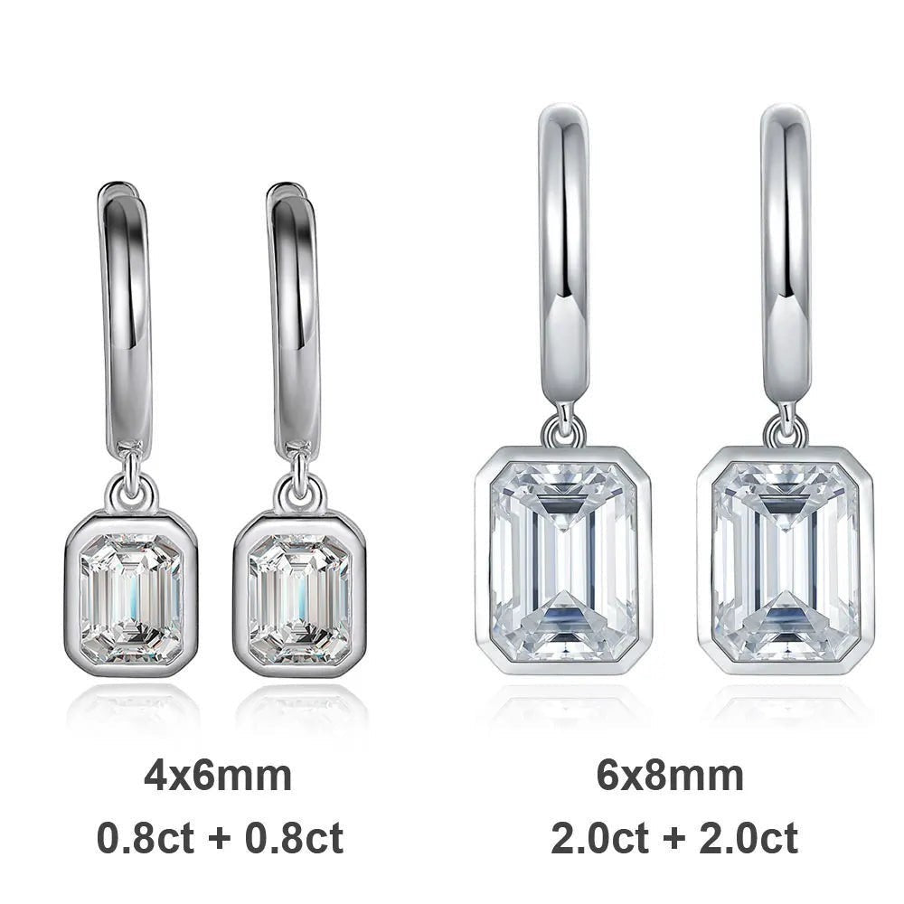 Bee-Bees D Color Emerald Moissanite Hoop Drop Earrings in 18k white gold plated sterling silver. Available in 0.8ct and 2.0ct sizes.