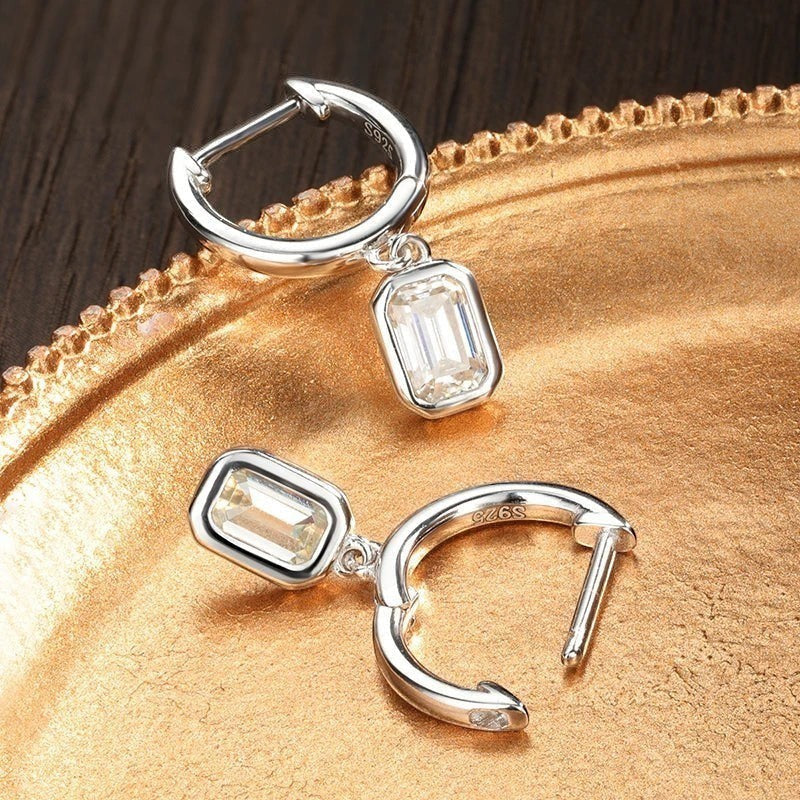 Bee-Bees D Color Emerald Cut Moissanite Hoop Drop Earrings in 18k White Gold Plated Sterling Silver.