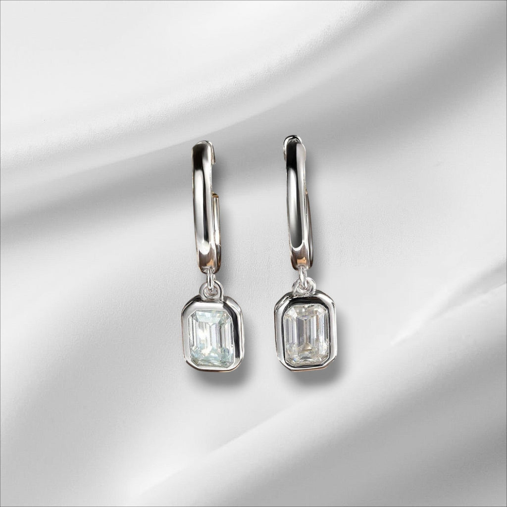 Bee-Bees D Color Emerald Moissanite Hoop Drop Earrings in 18k white gold plated sterling silver.