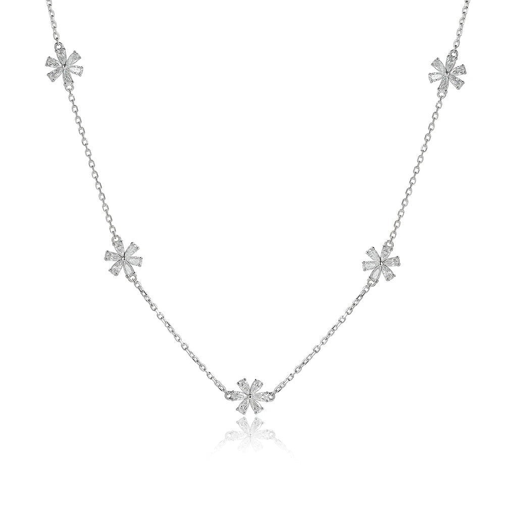 Bee-Bee's Sterling silver necklace with five small flower charms, each set with sparkling moissanite stones.