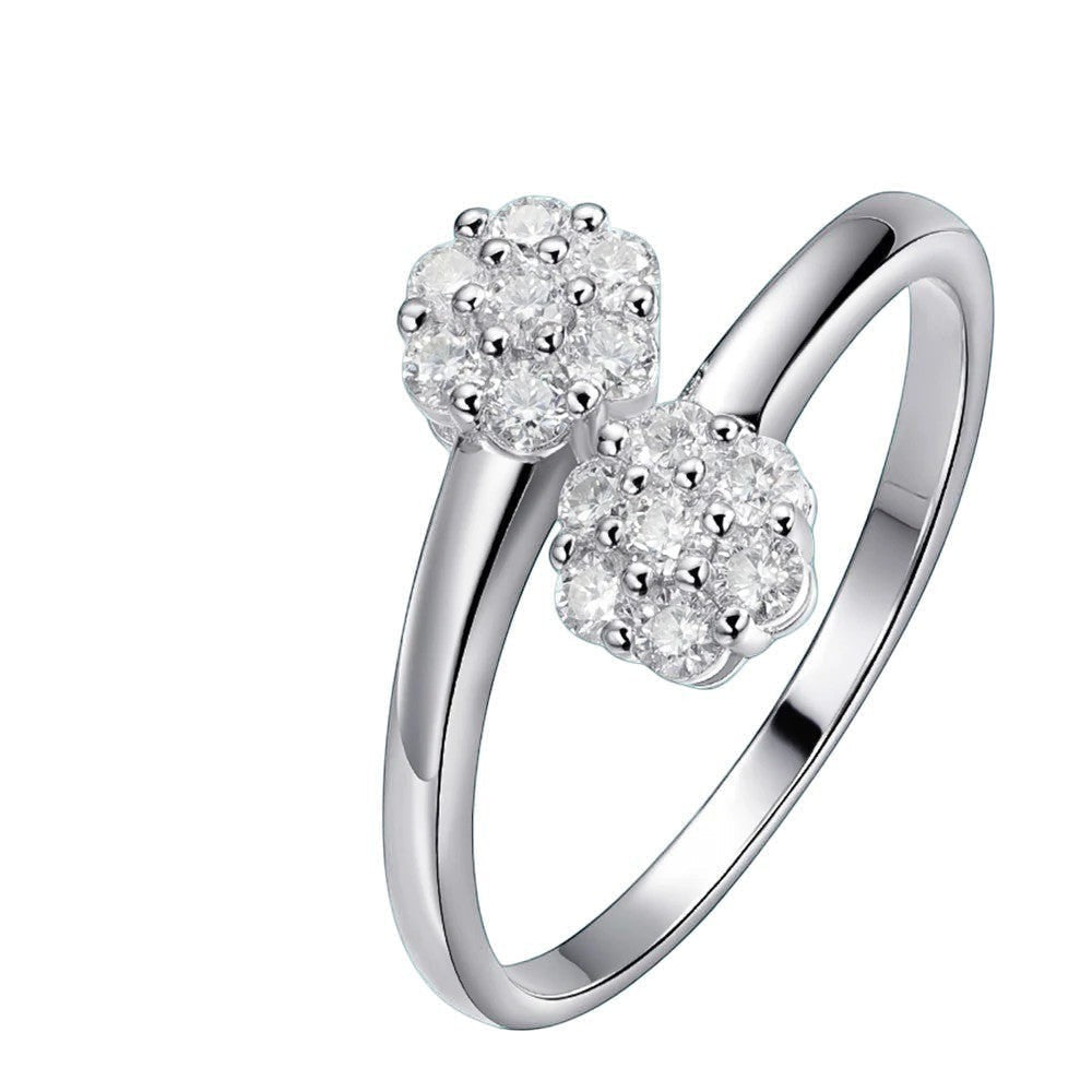 Bee-Bee's 2.5mm flower moissanite wedding ring in 925 silver with 18k gold plating. Features D VVS1 stones and GRA certification.