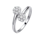 Bee-Bee's 2.5mm flower moissanite wedding ring in 925 silver with 18k gold plating. Features D VVS1 stones and GRA certification.