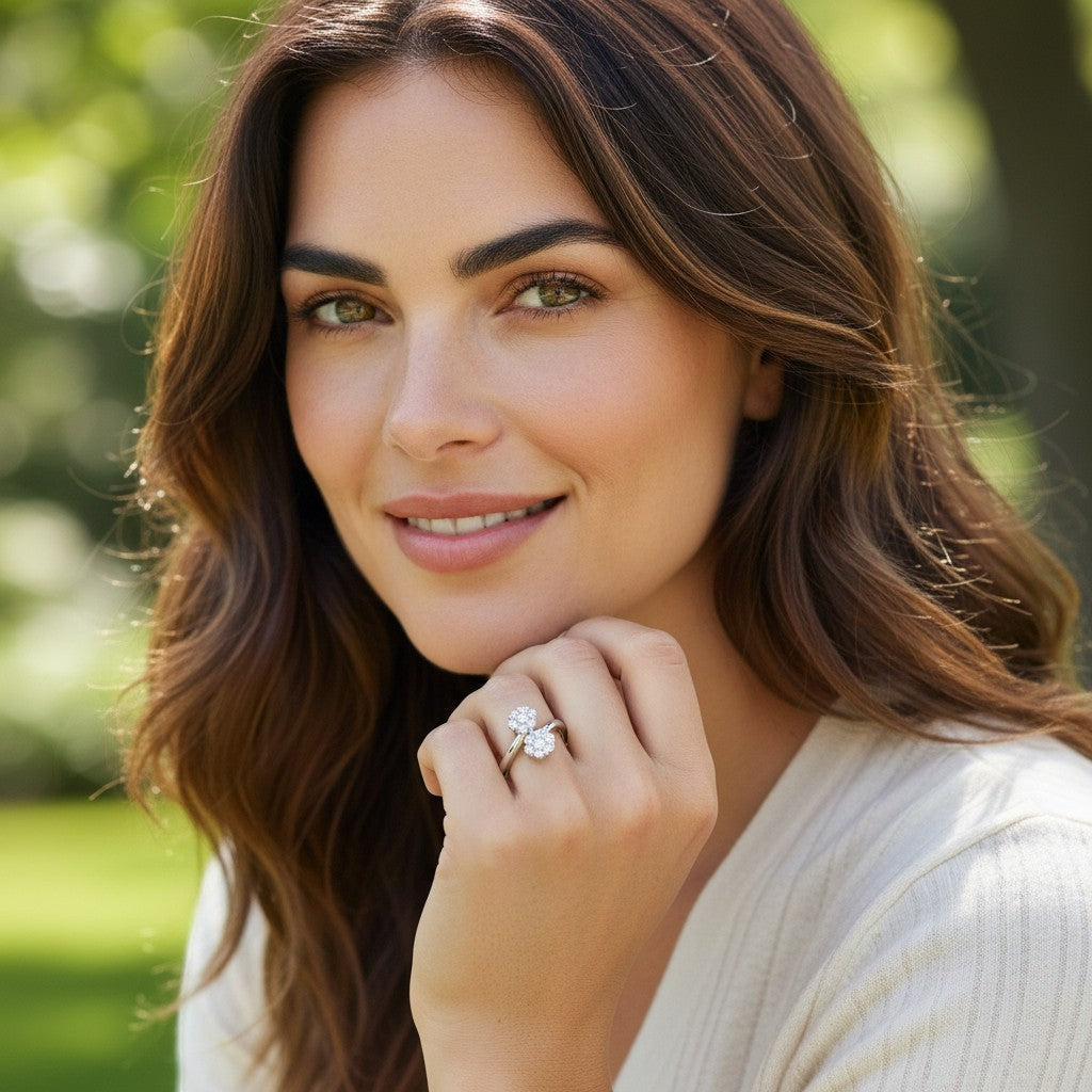 Bee-Bees flower moissanite wedding ring in 925 silver worn by a smiling woman in a natural outdoor setting