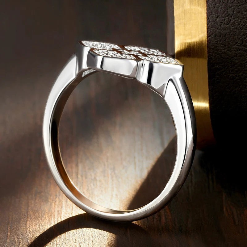 Bee-Bees silver ring with four-leaf clover design, encrusted with sparkling round brilliant cut moissanite stones.