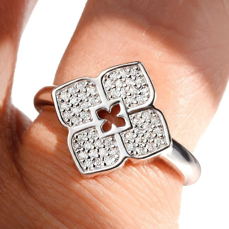 Bee-Bees four-leaf clover ring with pave moissanite stones in 18k gold plated sterling silver.