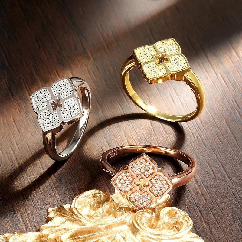 Bee-Bees Four-leaf clover ring in rose gold with pave moissanite stones, set in 18k gold plated sterling silver.