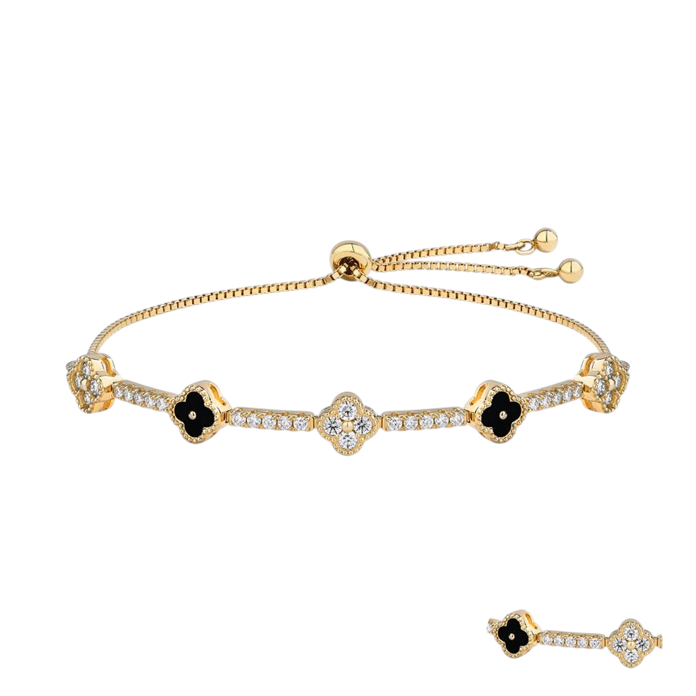 Bee-Bees 18K gold-plated sterling silver tennis bracelet featuring flower-shaped moissanite charms and black accents.