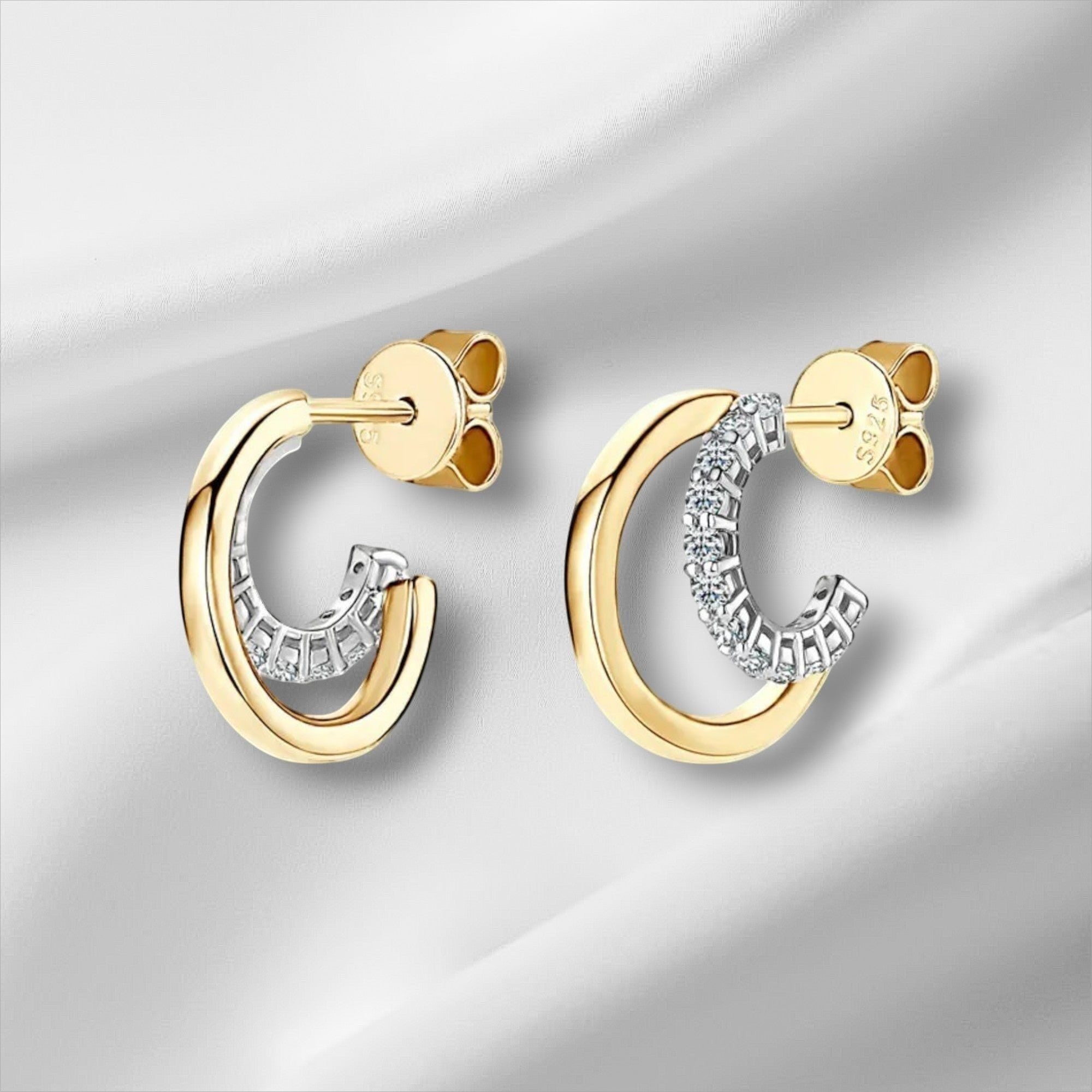 Bee-Bee's gold plated sterling silver huggie hoop earrings with pave set D Color VVS1 moissanite stones.