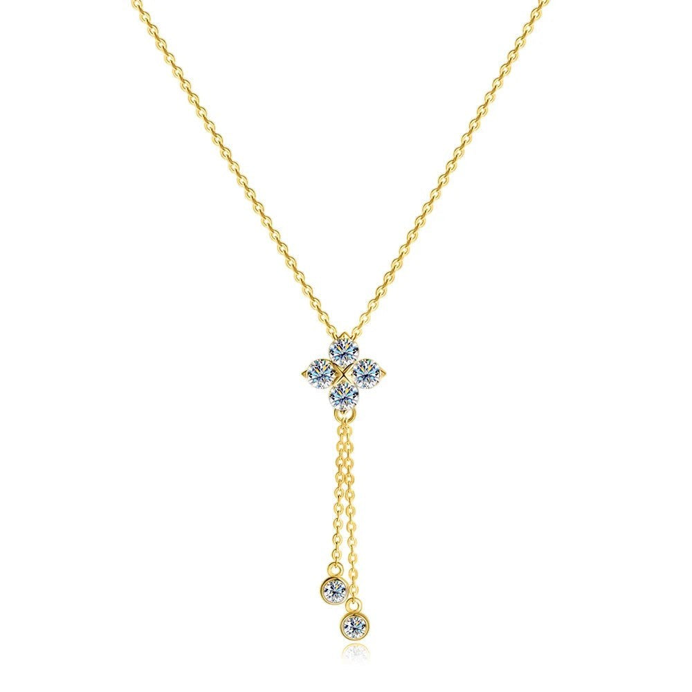 Bee-Bees gold-plated sterling silver necklace featuring a delicate floral moissanite pendant with dangling stones.