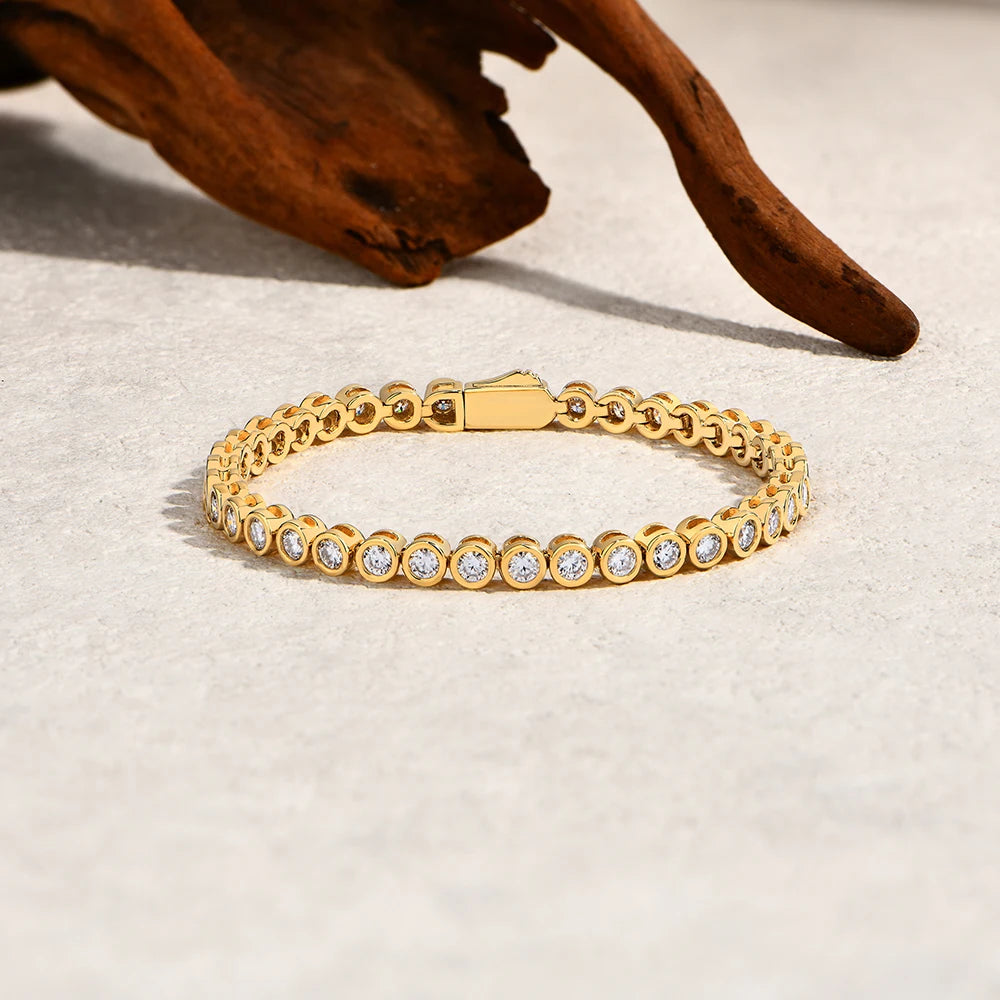 Bee-Bees gold-plated 925 sterling silver tennis bracelet featuring round-cut D color VVS1 moissanite stones.