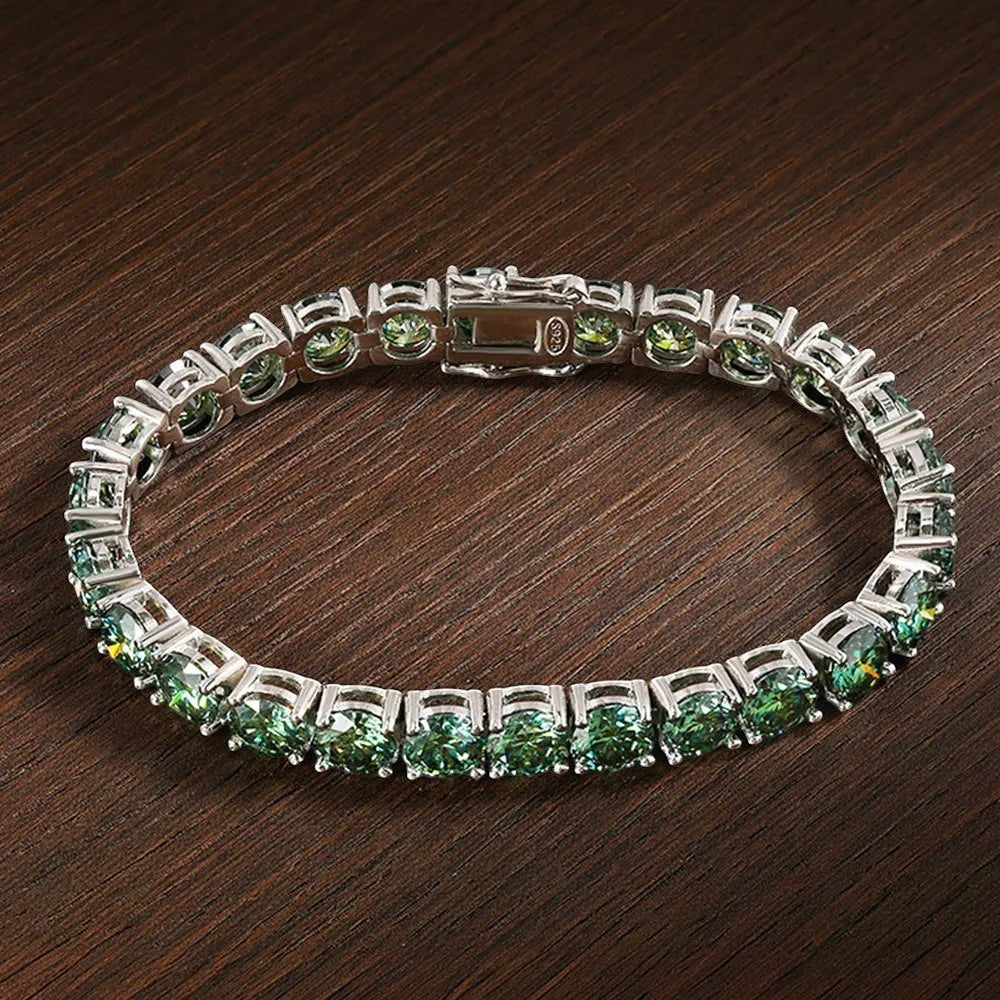 Bee-Bee's green moissanite tennis bracelet with s925 sterling silver and 18K gold plating. Features D color, VVS1 clarity stones.