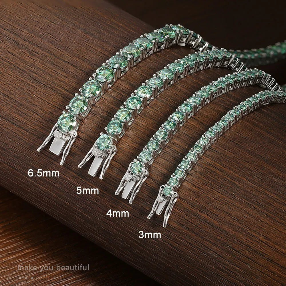 Bee-Bee's green moissanite tennis bracelet in s925 sterling silver with 18K gold plating, available in 3mm, 4mm, 5mm, and 6.5mm sizes.