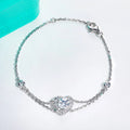 Bee-Bee's 1ct heart moissanite bracelet in sterling silver with 18k gold plating. Features a D VVS1 graded stone and GRA certificate.