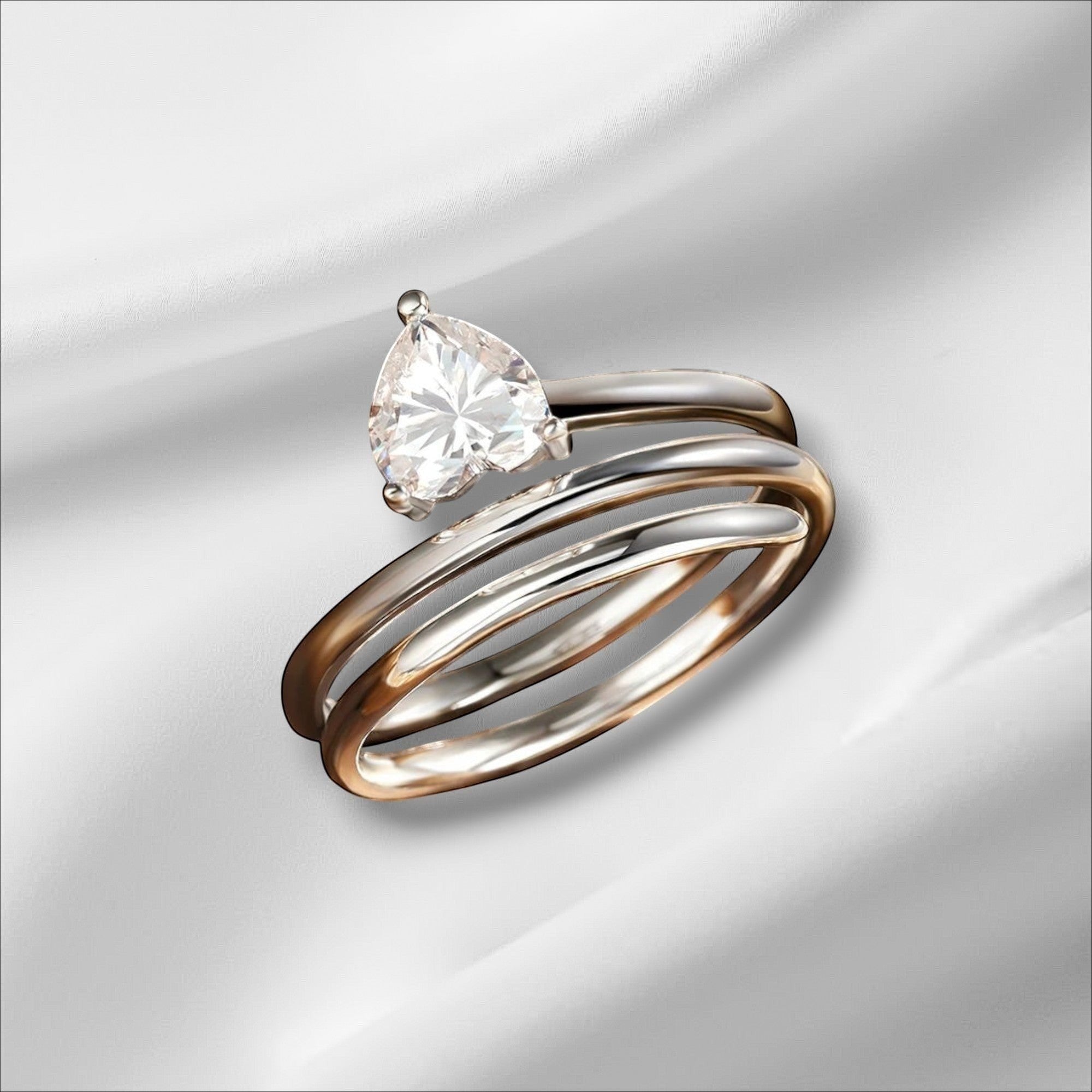 Bee-Bees 1ct heart cut moissanite spiral eternity ring in sterling silver with white gold plating.