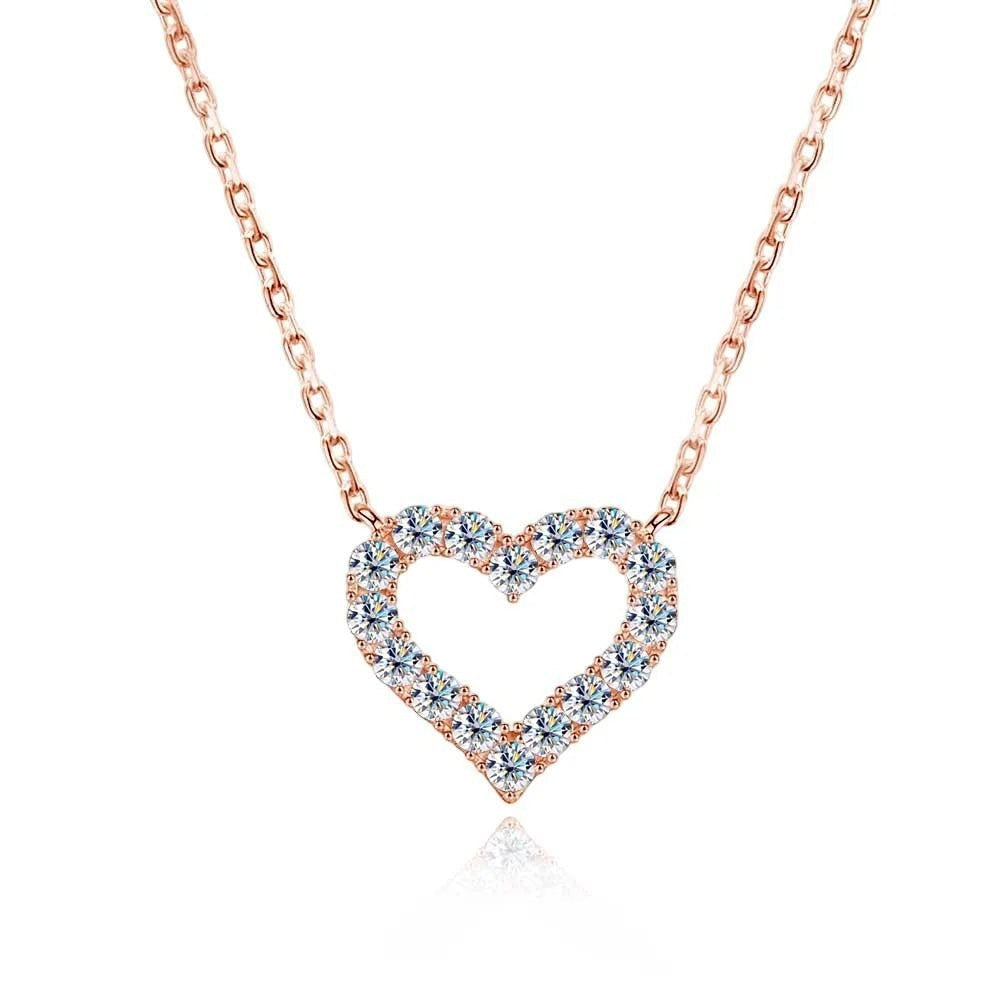 Bee-Bees rose gold plated S925 sterling silver necklace with a heart-shaped pendant encrusted with clear moissanite stones.
