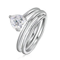 Bee-Bees 1ct heart cut moissanite spiral eternity ring in sterling silver with a twisted band design.