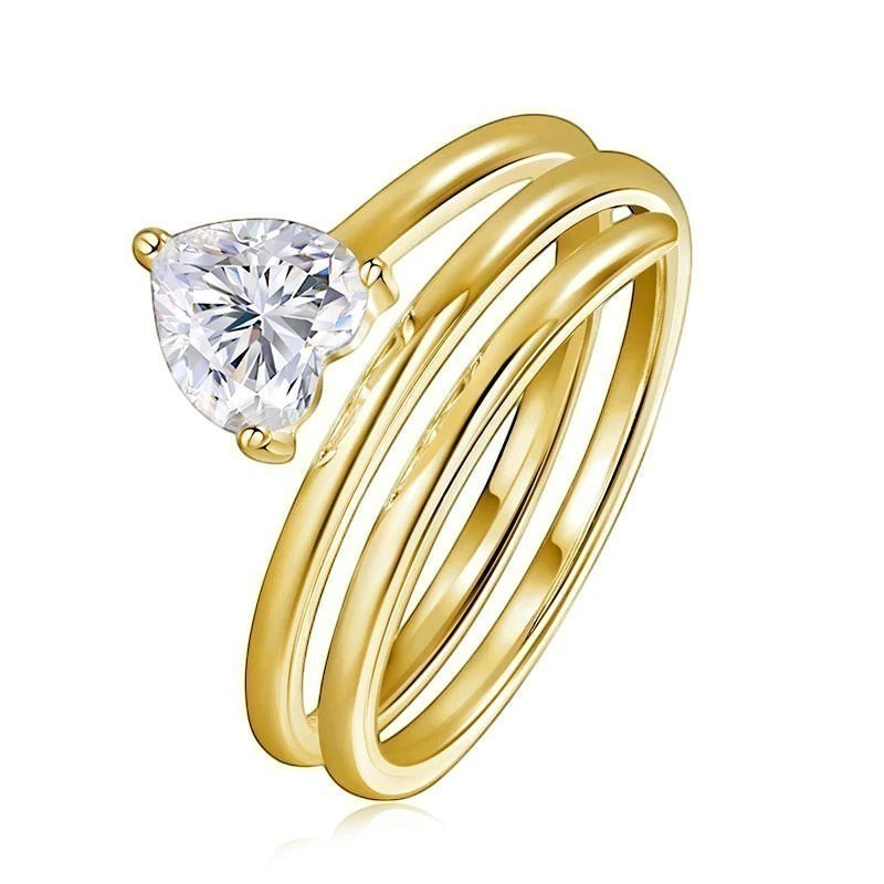 Bee-Bees 1ct heart cut moissanite spiral eternity band in yellow gold plated sterling silver.