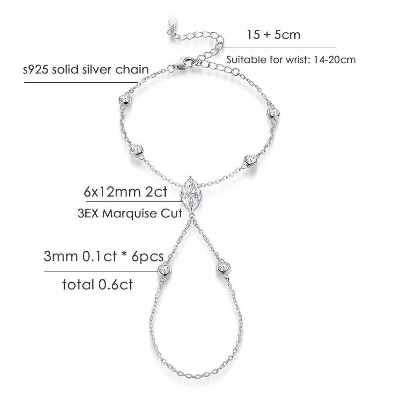Bee-Bees Marquise cut moissanite finger bracelet in s925 sterling silver with 18k gold plating. Features a 2ct center stone and smaller accent stones.
