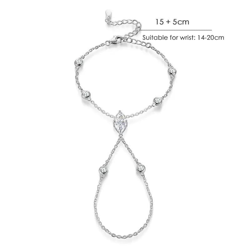 Bee-Bees sterling silver marquise cut moissanite finger bracelet with 2ct D VVS1 center stone and accent stones.