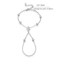 Bee-Bees sterling silver marquise cut moissanite finger bracelet with 2ct D VVS1 center stone and accent stones.