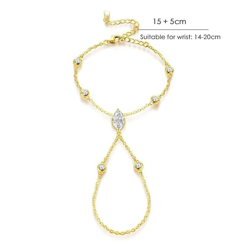 Bee-Bees gold plated s925 sterling silver hand chain bracelet with marquise cut moissanite and round accent stones.